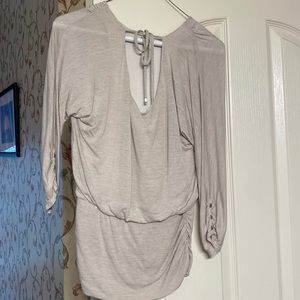 Cute pun strip beige top  tighter at waist
